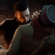 A screenshot of Vampyr's protagonist biting an enemy